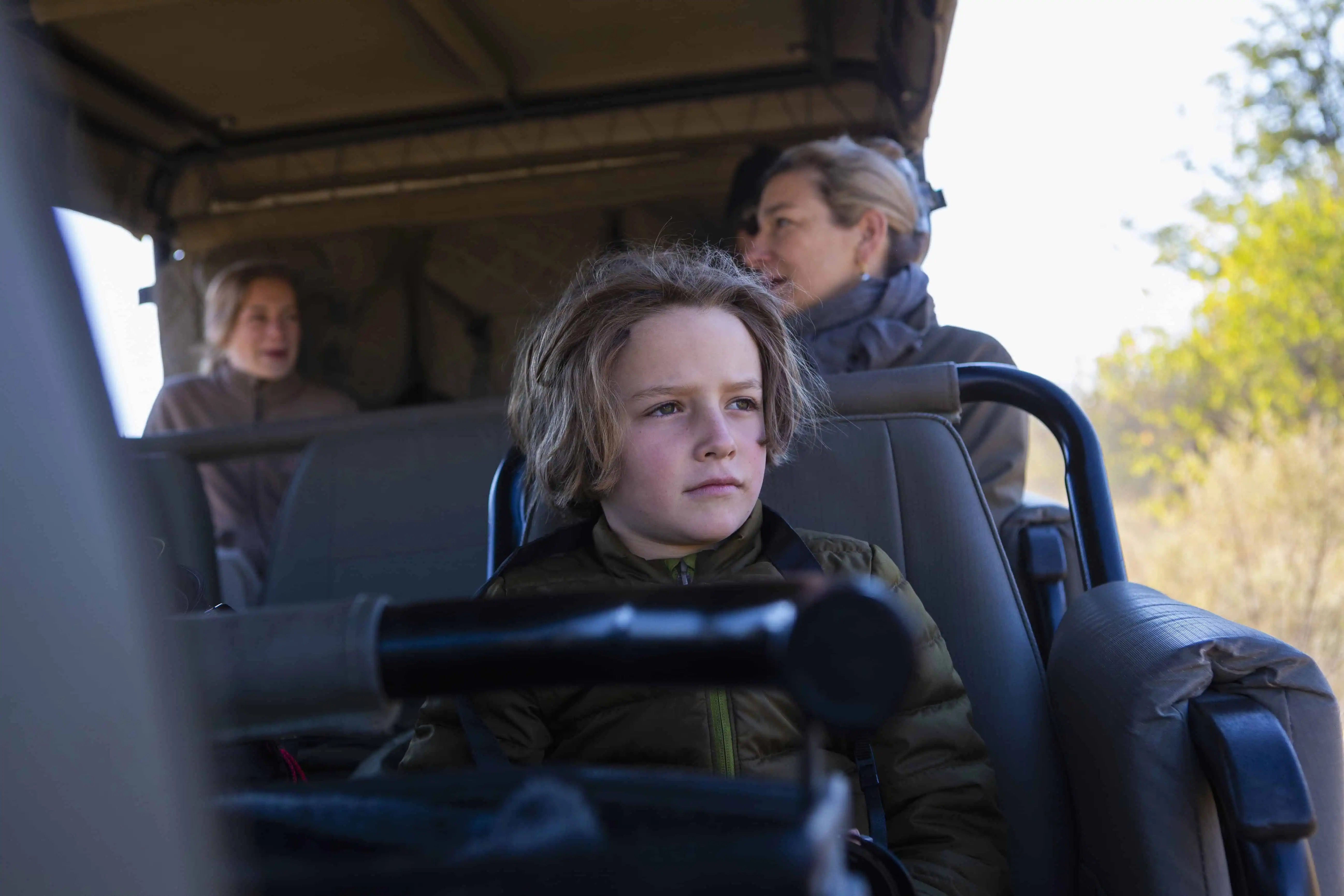 Young Boy In Safari Vehicle,Okavango Delta, Botswana